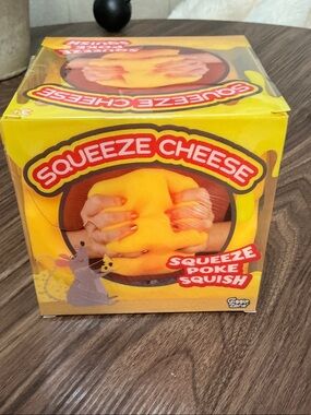 Squeeze Cheese Sensory Squish Toy - Bright Orange